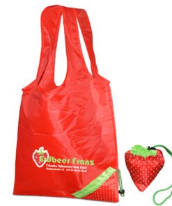 Foldable polyester bag including a small, sewn-on bag